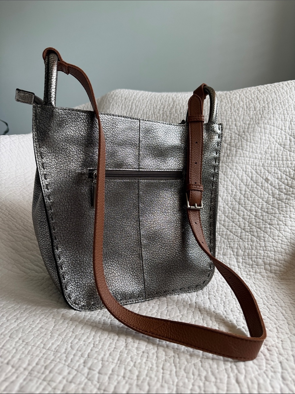 The Sak Metallic Silver Crossbody with Brown Strap